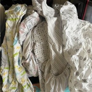 Assorted used crib sheets